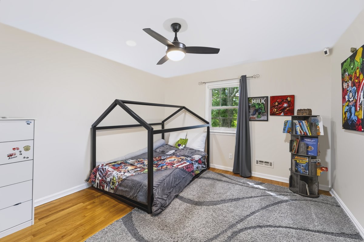 Spacious finished walk-out lower level family room with bright natural lighting