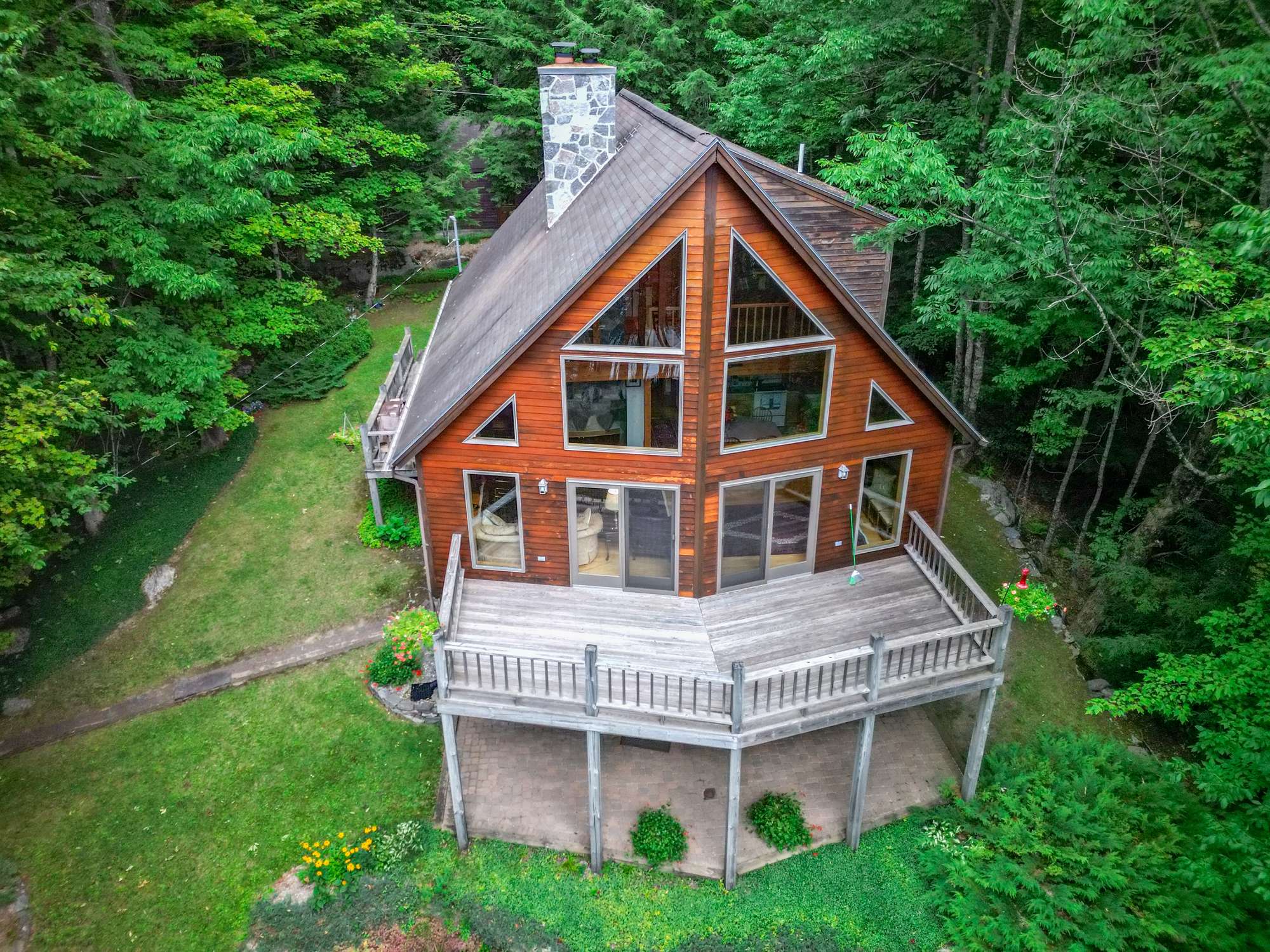Aerial drone view of 116 Hemlock lakefront chalet, Capital Region NY