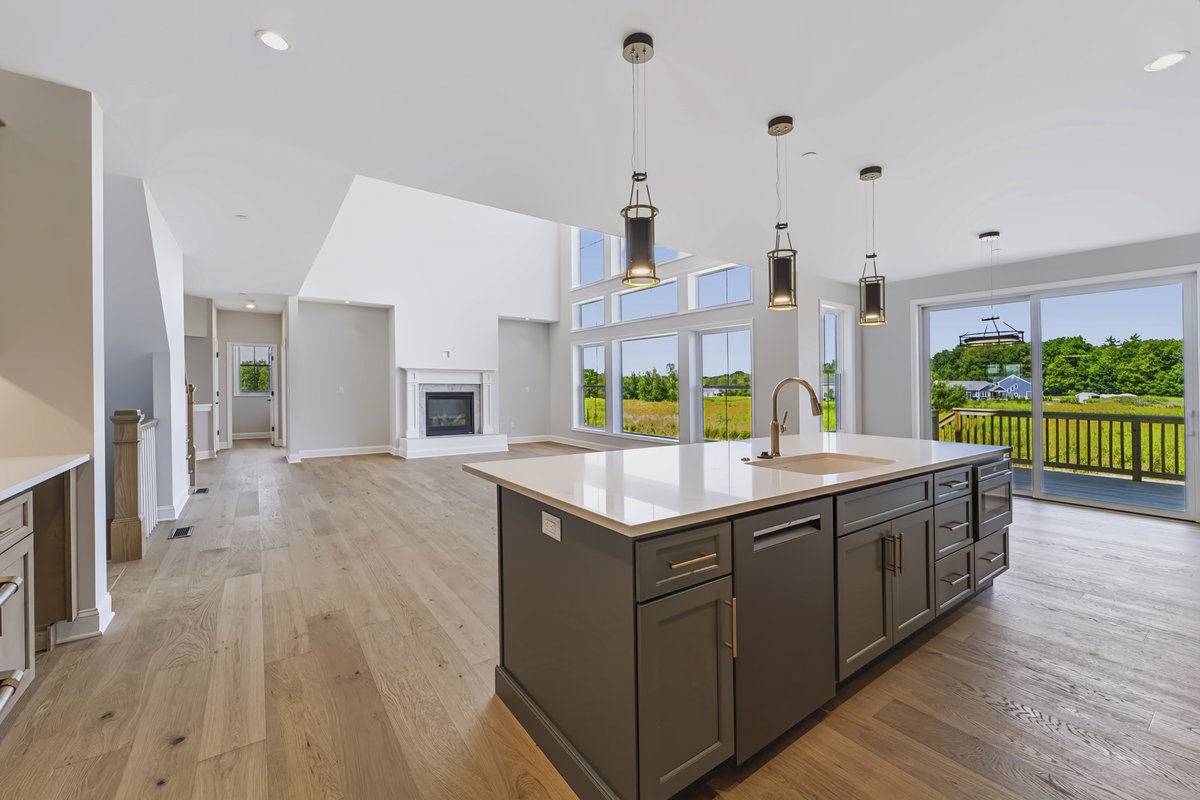 Dining area with sliding glass patio doors and outdoor garden view window pull