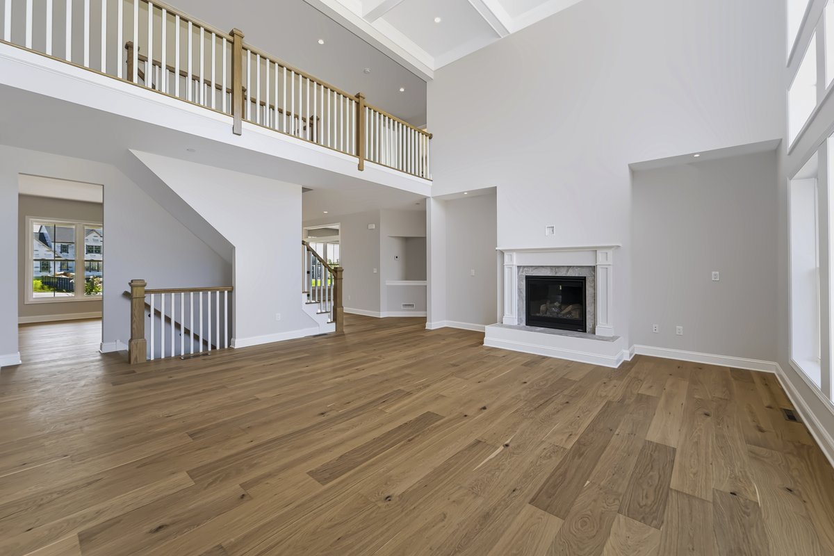 Sunlit primary bedroom retreat with expansive double-hung windows — Capital Region NY