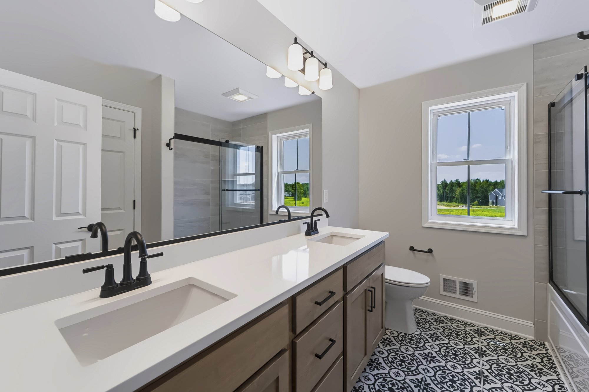 Bathroom with patterned tile floor — HDR real estate photography, Capital Region NY