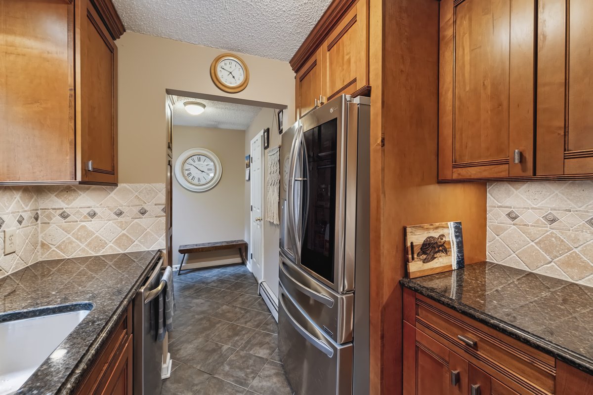 Craftsman home interior with restored woodwork, panel doors, and sunny double-hung windows
