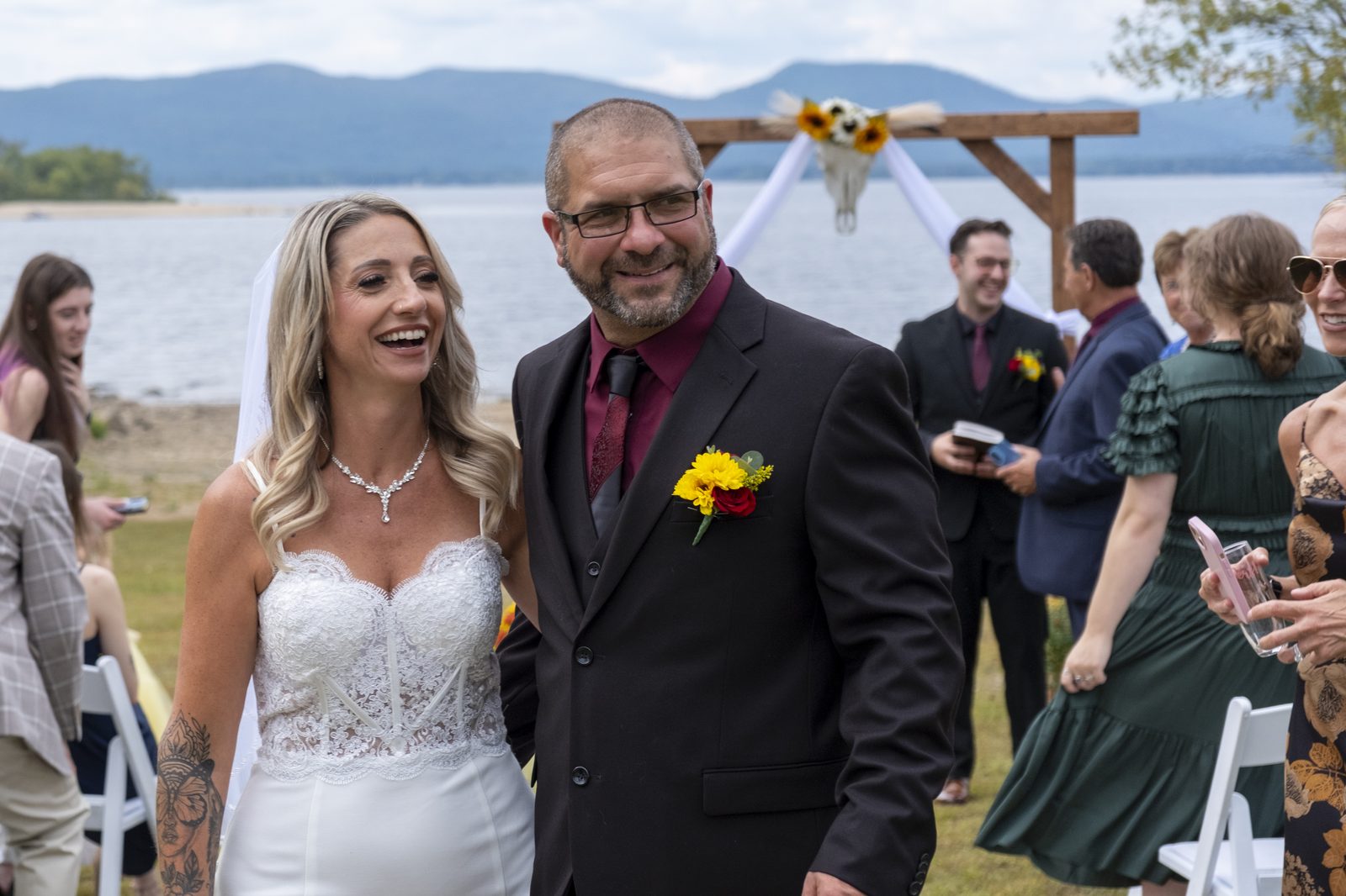Bride and groom walking down the aisle together — Capital Region wedding